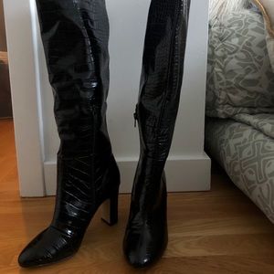 Knee high black leather boots